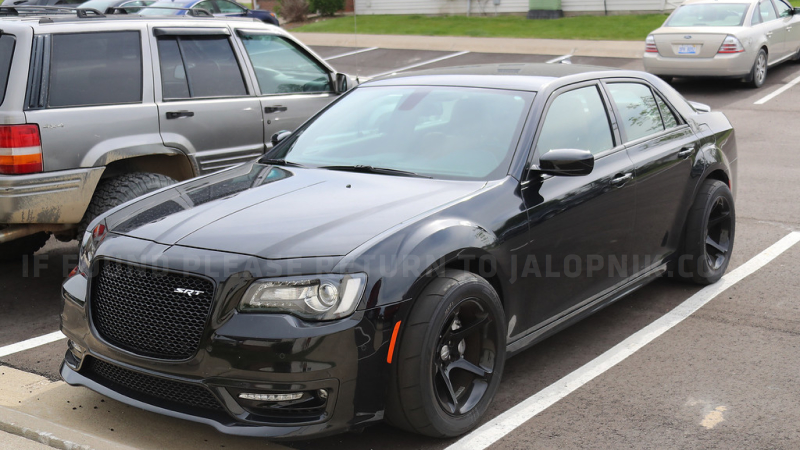 Illustration for article titled What The Hell Is This Widebody Chrysler 300 SRT With Dodge Demon Wheels?